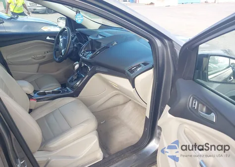 2014 Ford Escape Titanium z USA, uszkodzony, nr VIN 1FMCU0JX7EUC64583